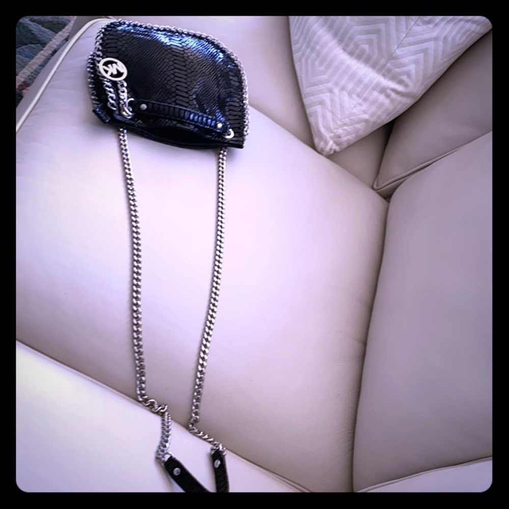 MK snake skin black leather w silver chain around
